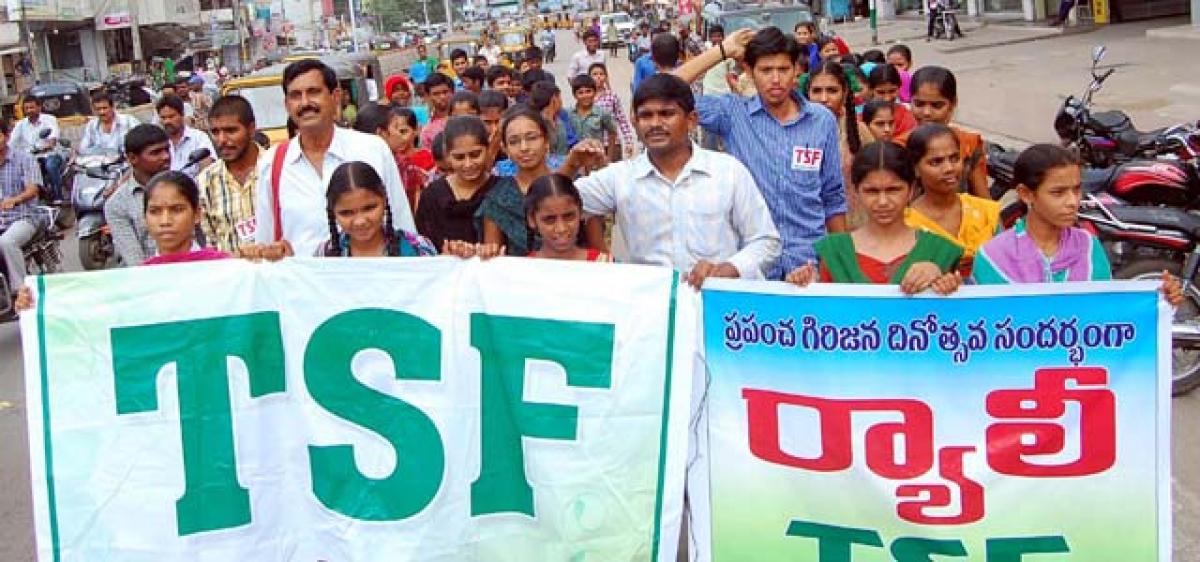 Tribal Students Federation members and students taking out a rally in Khammam on Sunday on the occasion of &lsquo;World Tribal Day&rsquo;
